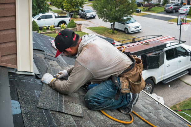 Professional Roofing technician working in Konawa, OK